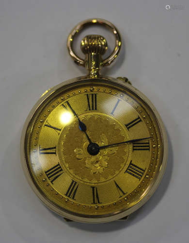 A gold cased keyless wind open-faced lady's fob watch with an unsigned gilt cylinder movement, the