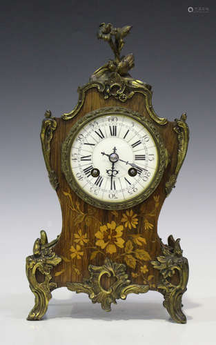 A late 19th century French gilt metal mounted and inlaid rosewood mantel clock with eight day