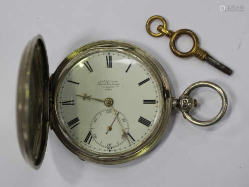 A silver hunting cased keywind gentleman's pocket watch, the gilt lever movement detailed 'Jas