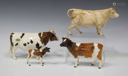 A group of four Beswick models of cows, comprising Ayrshire Bull Ch. 'Whitehill Mandate', No. 1454B,