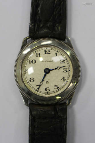 A Harwood Self Winding Watch Co Ltd silver circular cased wristwatch with a signed movement and