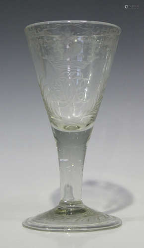 A Continental engraved wine glass, late 18th century, the conical bowl engraved with a crowned