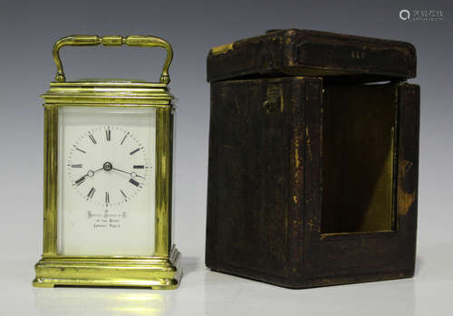 A late 19th century French lacquered brass carriage timepiece, the backplate with stamped 'Japy