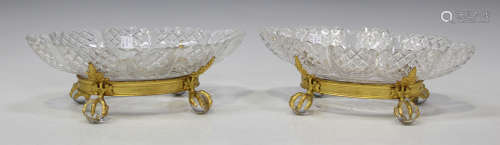 A pair of F.C. Osler cut glass and gilt brass oval bowls and stands, late 19th century, each stand
