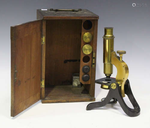 A late 19th century lacquered and black enamelled brass monocular microscope, signed 'Henry Crouch