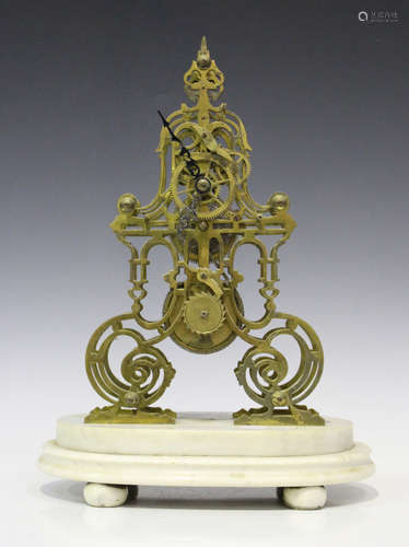 A late 19th century brass skeleton timepiece with single fusee movement, the pierced scrollwork