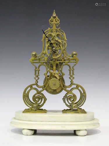 A late 19th century brass skeleton timepiece with single fusee movement, the pierced scrollwork
