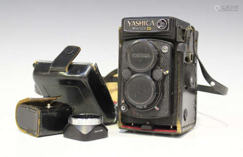 A Yashica Mat-124G twin lens reflex camera, No. 112790, with 1:2.8 f=80mm and 1:3.5 f=80mm lenses,