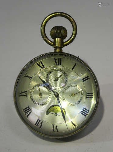 An early 20th century magnifying glass globe desk timepiece, the silvered circular dial with