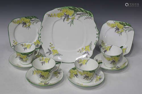An Art Deco Shore & Coggins Bell China part service, circa 1930s, decorated with stylized yellow