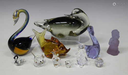 A small group of glass models, including a Murano duck, fish and swan, and four Swarovski animals.