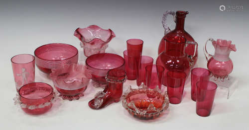 A group of cranberry glassware, late 19th/early 20th century, including three bowls with trailed