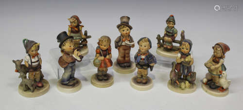 A group of nine Goebel Hummel figures, including Wayside Harmony, Feeding Time and Be Patient (minor
