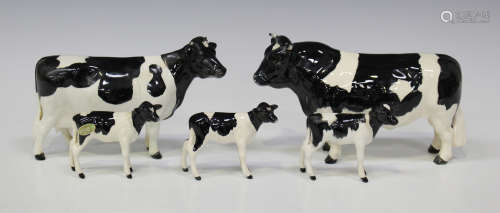 A group of five Beswick models of cows, comprising Friesian Cow Ch. 'Clayburg Leegwater', No.