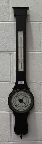 A French Napoleon III ebonized wheel barometer with mercury thermometer and opaline glass dials,