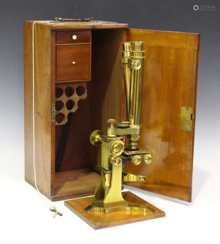 A late 19th century lacquered brass binocular microscope, signed 'Baker 244. High Holborn London',