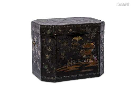 A LARGE CHINESE MOTHER-OF-PEARL INLAID BLACK LACQUER CASKET. Early Qing. Of canted rectangular section, inlaid all over in mother-of-pearl the front depicting two deer below a pine tree, 30cm wide, 50cm long, 40cm H. 清早期   黑漆嵌螺鈿奩