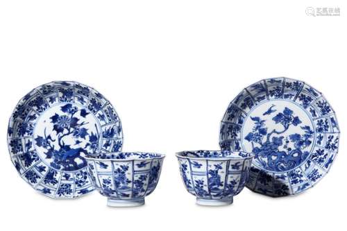 A PAIR OF CHINESE BLUE AND WHITE CUPS AND SAUCERS. Kangxi. With lobed vertical panels enclosing birds and flowers, 9 - 13cm diameter. (4) 清康熙   青花花鳥紋杯碟一對