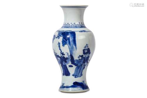 A CHINESE BLUE AND WHITE VASE. Kangxi. Of baluster form with waisted neck and flared rim, the body painted with a scene of figures in a landscape beneath rocks and overhanging pines, 26cm H. 清康熙   青花人物故事紋撇口尊