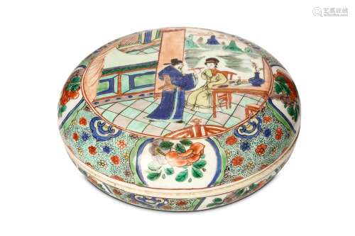 A CHINESE FAMILLE VERTE CIRCULAR BOX AND COVER. Kangxi. The circular box and cover decorated to the cover with a circular panel enclosing a lady seated before a screen beside a scholar holding a brush, the sides of the box and cover decorated with