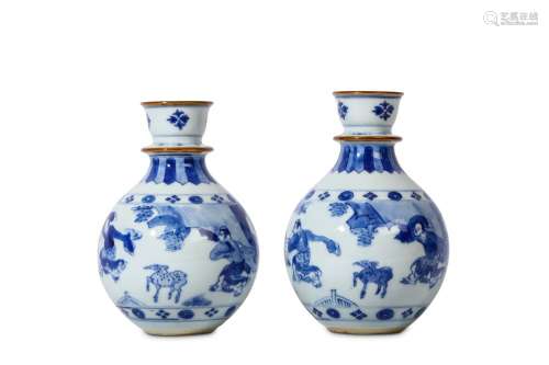 A PAIR OF CHINESE BLUE AND WHITE HOOKAH BASES. Kangxi. The globular body rising from a recessed base to a tall flanged neck with cup-shaped mouth, the body painted with dancing figures beside deer on a garden veranda, below pail and dark blue pendant
