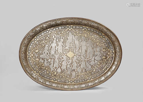 A MIDDLE EASTERN GILT-DECORATED IRON DAMASCENED OVAL TRAY