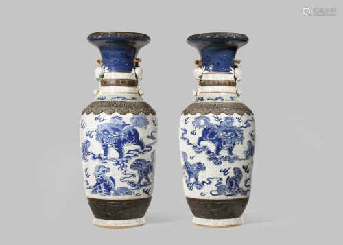 A PAIR OF CHINESE CRACKLE GLAZED 'LION DOG' VASES