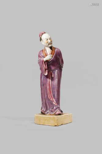 A CHINESE POLYCHROME FIGURE OF A SCHOLAR