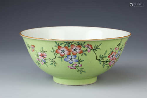 A CHINESE FAMILLE ROSE LIME GREEN-GROUND BOWL
