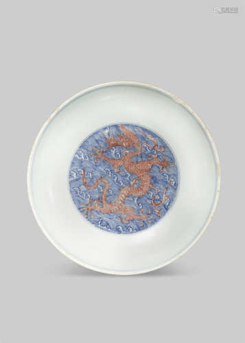A CHINESE BLUE AND WHITE AND UNDERGLAZE RED 'DRAGON' DISH