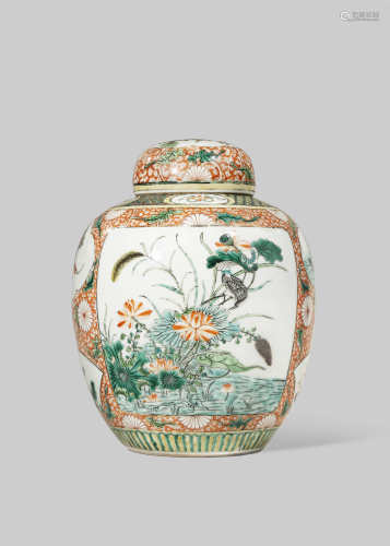 A CHINESE FAMILLE VERTE JAR AND COVER