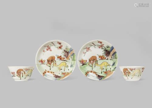 A PAIR OF CHINESE FAMILLE ROSE 'DEER' TEA BOWLS AND SAUCERS
