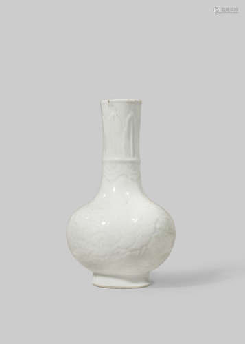 A CHINESE WHITE GLAZED BOTTLE VASE