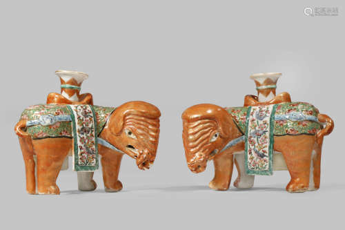 A PAIR OF CHINESE CANTON FAMILLE ROSE MODELS OF ELEPHANTS