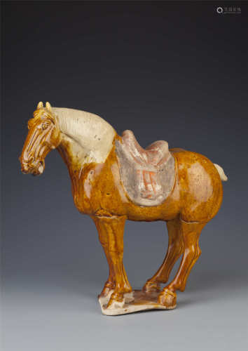 A CHINESE GLAZED POTTERY MODEL OF A HORSE