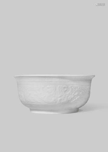 A CHINESE WHITE GLAZED MOULDED BOWL