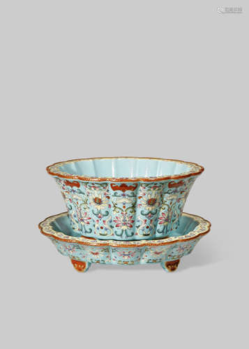 A CHINESE FAMILLE ROSE TURQUOISE GROUND JARDINIERE AND STAND