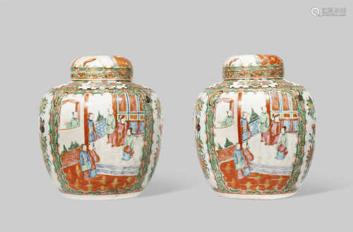 A PAIR OF CHINESE CANTON FAMILLE ROSE JARS AND COVERS