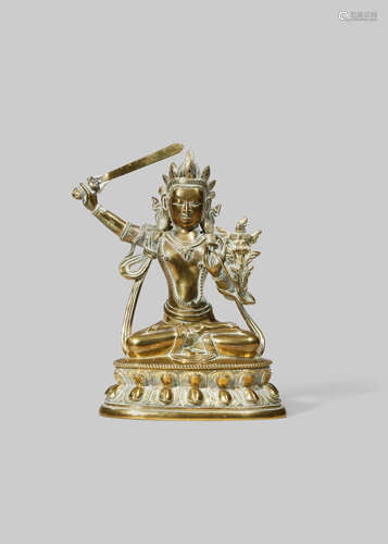 A TIBETAN BRONZE FIGURE OF MANJUSRI