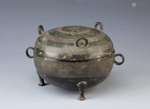 A CHINESE BRONZE DING AND COVER