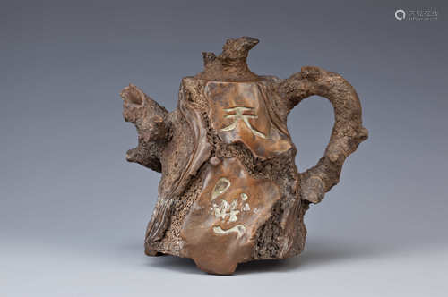 A CHINESE YIXING WINE POT AND COVER