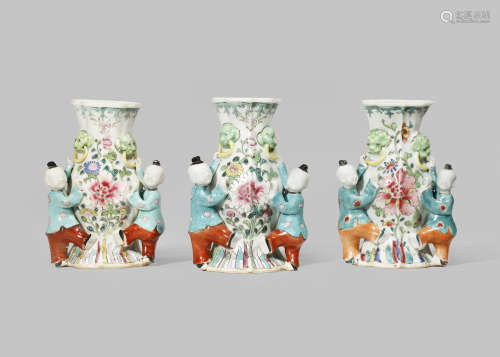 A SET OF THREE CHINESE FAMILLE ROSE WALL VASES