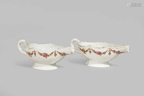 A PAIR OF CHINESE FAMILLE ROSE SAUCE BOATS