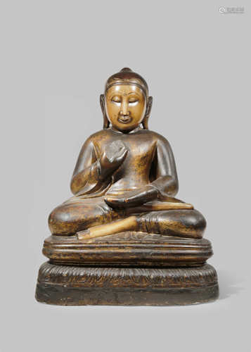 A BURMESE LACQUERED AND GILT-MARBLE FIGURE OF BUDDHA SHAKYAMUNI