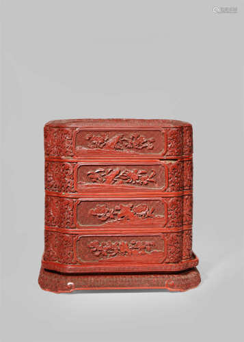 A CHINESE CINNABAR LACQUER THREE TIERED BOX