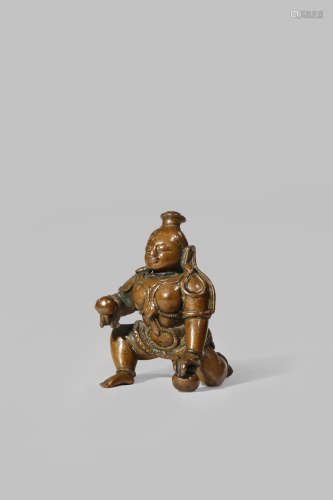 AN INDIAN COPPER FIGURE OF THE BABY KRISHNA