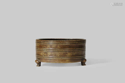 A CHINESE BRONZE CYLINDRICAL INCENSE BURNER