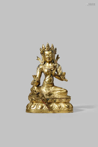 A CHINESE GILT-BRONZE FIGURE OF A GREEN TARA