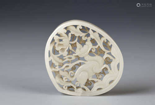 A CHINESE WHITE JADE RETICULATED PLAQUE