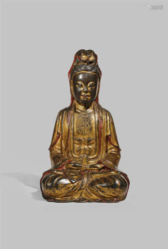 A CHINESE GILT AND LACQUERED BRONZE FIGURE OF GUANYIN